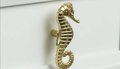 Shiny gold sea horse cabinet pull/Brass seahorse door handle/seaside drawer pull/gold furniture hardware/upcycling door knob/beach decor