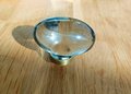 Grey oval crystal and brass cabinet pull/Retro cool grey egg shape crystal drawer knob/mid century style smooth polished crystal door handle