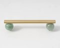 Silky matte gold brass bar handle resting on semi precious stone balls/colourful cabinet handle/stone furniture hardware/crystal drawer pull