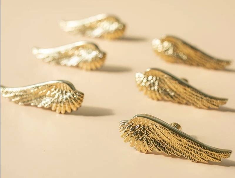 Small shiny gold or silver angel wing cabinet pull/Feathered wing drawer handle/Shiny furniture hardware/small bird wing shaped door knob