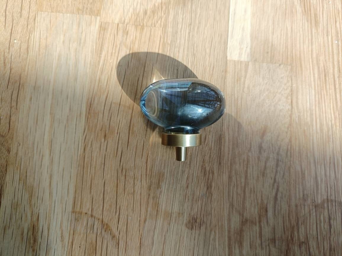 Grey oval crystal and brass cabinet pull/Retro cool grey egg shape crystal drawer knob/mid century style smooth polished crystal door handle