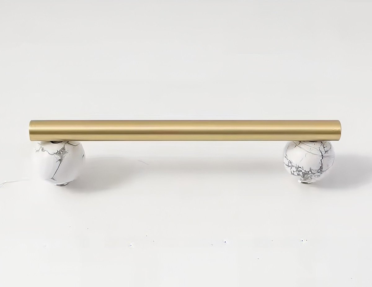 Silky matte gold brass bar handle resting on semi precious stone balls/colourful cabinet handle/stone furniture hardware/crystal drawer pull
