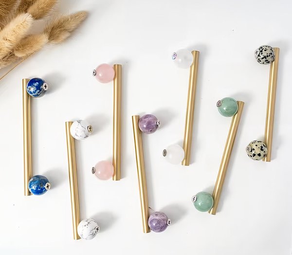 Silky matte gold brass bar handle resting on semi precious stone balls/colourful cabinet handle/stone furniture hardware/crystal drawer pull